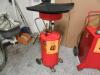 Pressurized Steel Oil Extractor and Oil Drain *100 Industrial Dr Adrian, MI 49221*