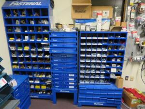 LOT OF ASST'D FASTENAL RACK AND PART CABINETS W/ ASST'D CAP SCREW, NUTS, WASHERS, FUZES, PIPE NIPPLES, PIPE CROSSES, SCREWS, LOCK NUTS, HEX DRIVES, UI