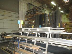 (LOT) ASSORTED ALUMINUM AND STEEL RAW MATERIAL, CANTILEVER RACK, OTHER RACKS AND TABLES INCLUDED