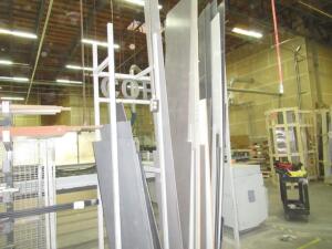 (LOT) ASSORTED SHEETS OF CORIAN SOLID SURFACE AND PRE CUT SHEETS, RACK AND CARTS INCLUDED