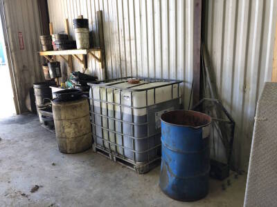 Lot of Asst. Oil Drip Pans, Storage Tote, Barrels, Pails, etc. Located at 310-2nd Ave. Fox Creek, AB T0H 1P0