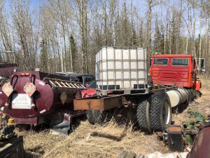 Lot of Asst. Storage Tank, Truck, (3) Truck Tanks, (3) Cars, Pump, (All for Parts or Not Running) Located at 310-2nd Ave. Fox Creek, AB T0H 1P0