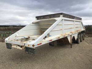 1994 Tri-Axle Bottom Dump Trailer 2 belly clam shell dumps Serial No 2U9CD6828R1012582 Unit No 2220 Located at 2020 1st Ave. Edson, AB, T7E 1T8