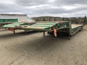 2016 Manac Tri-Axle Scissor Neck Tridem Lowboy Trailer 54' with center live roll 10" live roll Serial No 2M5131612G1155812 Unit No 2233 Located at 2020 1st Ave. Edson, AB, T7E 1T8