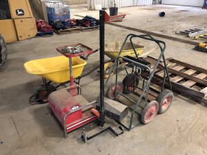 Lot of (2) Bottle Carts, (2) Wheel Barrows, Headlight Aiming System, etc. Located at 2020 1st Ave. Edson, AB, T7E 1T8