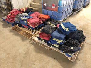 Lot of (3) Pallets of Asst. Coveralls Located at 2020 1st Ave. Edson, AB, T7E 1T8