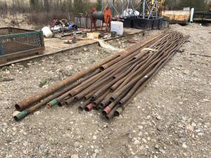 Lot of (2) 40' Rig Mats, Asst. Pipe, Reel, Chain, Fittings, etc. Located at 2020 1st Ave. Edson, AB, T7E 1T8