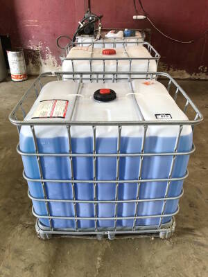 Lot of (3) Totes of Asst. Windshield Washer Fluid w/ Pump etc. Located at 5603-50 Ave. Warburg, AB T0C 2T0