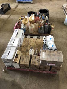 Lot of (2) Pallets of Asst. Oils, Fluids, Drip Pans, etc. Located at 5603-50 Ave. Warburg, AB T0C 2T0