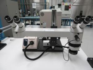 MOTIC DUAL HEADED BINOCULAR STEREO MICROSCOPE WITH 10X EYES, AND SCIENSCOPE IL-FOI-150 PLUS HALOGEN LAMP