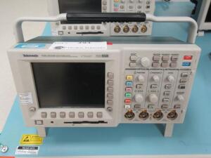 TEKTRONIX TDS 3034B FOUR CHANNEL COLOR DIGITAL PHOSPHOR OSCILLOSCOPE, S/N: B013022, WITH TDS 3GV MODULE