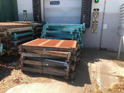 LOT, STACK RACK PARTS, MOSTLY BASES, VERY FEW POLES, APPROXIMATELY 150 BASES, LOCATED OUTSIDE