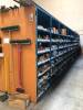 LOT, 8 ROWS OF METAL SHELVING, 1 ROW AGAINST WALL, APPROXIMATELY 99 SECTIONS, INCLUDES SHELF CONTENTS (MOSTLY SPARE PARTS), 2 YELLOW CABINETS, MISC FURNITURE - 5