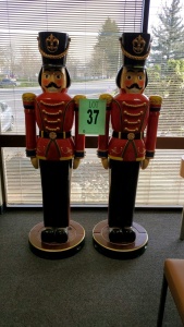 SET OF 2, 6FT TALL NUTCRACKERS CAST IN RESIN