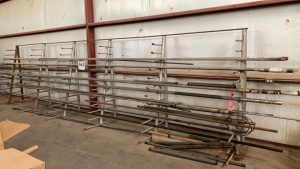 LOT ASST'D PIPES WITH (2) PIPE RACKS, (BOLTED TO FLOOR BUYER MUST CUT ALL BOLTS FROM FLOOR)(LOCATION: - 3401 Garden City Hwy Midland, TX 79705)