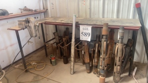 Lot asst&#8217;d tubing anchors, asst&#8217;d parts, metal table with vise, - (LOCATION: - 3401 Garden City Hwy Midland, TX 79705)