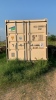 SHIPPING CONTAINER ON SKID APROX 19FT WITH METAL SHELVING, ASSTD BOLTS, FLANGES, & FITTINGS (LOCATION: Jourdanton, TX)