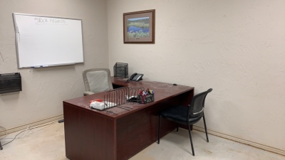 LOT OF ASSTD OFFICE FURNITURE: (3) WOOD DESKS WITH (2) OFFICE CHAIRS, (1) ROUND CONFERENCE TABLE WITH (4) ASSSTD CHAIRS, (1) TABLE, (3) SHELVES, (7)ASSTD FILING CABINETS (LOCATION: Jourdanton, TX)