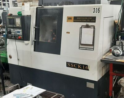 2006 Shenyang Model SSCK16 CNC Slant Bed Lathe, Gang Style Tooling, W/ Fanuc Series OI MATE-TC CNC Control, Chip Conveyor, S/N 01 (Olivet, Michigan)