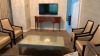 SUITE 1360 ASSTD VINTAGE FURNITURE: DINING ROOM TABLE WITH (8) CHAIRS, WOOD HUTCH, SIDE CHAIRS, SOFA, TABLE TOP COMMODE, MIRRORS, (2) SAMSUNG 50 INCH TELEVISIONS, BED FRAME WITH NIGHT STAND, SMALL WOOD DESK, IRON, MINI FRIDGE ( NO FIXTURES: LIGHT FIXTURES - 2