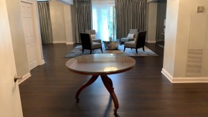 SUITE 1300 ASSTD VINTAGE FURNITURE: DINING ROOM TABLE WITH (8) CHAIRS,SIDE CHAIRS, SOFA, TABLE TOP COMMODE, MIRRORS, (2) SAMSUNG 50 INCH TELEVISIONS, FOUR POST BED FRAME WITH NIGHT STAND, SMALL WOOD DESK, IRON, MINI FRIDGE ( NO FIXTURES: LIGHT FIXTURES, T