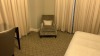 ROOM 1340 FURNITURE: KING SIZE BED FRAME, SOFA, DINING TABLE WITH (6) CHAIRS, WOOD HUTCH, COFFEE TABLE WITH CHAIRS, KEURIG COFFEE MAKER, MINI FRIDGE, LAMPS, NIGHT STAND, COMMODE, (2) SAMSUNG TELEVISIONS, DESK WITH CHAIR & IRON ( NO FIXTURES: LIGHT FIXTURE - 12