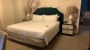 ROOM 1340 FURNITURE: KING SIZE BED FRAME, SOFA, DINING TABLE WITH (6) CHAIRS, WOOD HUTCH, COFFEE TABLE WITH CHAIRS, KEURIG COFFEE MAKER, MINI FRIDGE, LAMPS, NIGHT STAND, COMMODE, (2) SAMSUNG TELEVISIONS, DESK WITH CHAIR & IRON ( NO FIXTURES: LIGHT FIXTURE - 13