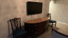 ROOM 1348 FURNITURE: KING SIZE BED FRAME, CHAIR, KEURIG COFFEE MAKER, MARBLE TOP TABLE, COMMODE, MINI FRIDGE, LAMPS, NIGHT STAND, (2) SAMSUNG TELEVISION, DESK WITH CHAIR, SOFA, COFFEE TABLE WITH CHAIRS & IRON ( NO FIXTURES: LIGHT FIXTURES, TOILET, SINK, T - 6