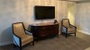 ROOM 2328 FURNITURE: KING SIZE BED FRAME, KEURIG COFFEE MAKER, MARBLE TOP TABLE, COMMODE, MINI FRIDGE, LAMPS, NIGHT STAND, (2) SAMSUNG TELEVISION, DESK WITH CHAIR, SOFA, COFFEE TABLE WITH CHAIRS & IRON ( NO FIXTURES: LIGHT FIXTURES, TOILET, SINK, TUB, ETC - 5