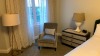 ROOM 2328 FURNITURE: KING SIZE BED FRAME, KEURIG COFFEE MAKER, MARBLE TOP TABLE, COMMODE, MINI FRIDGE, LAMPS, NIGHT STAND, (2) SAMSUNG TELEVISION, DESK WITH CHAIR, SOFA, COFFEE TABLE WITH CHAIRS & IRON ( NO FIXTURES: LIGHT FIXTURES, TOILET, SINK, TUB, ETC - 8