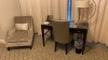 ROOM 2341 FURNITURE: KING SIZE BED FRAME, CHAIR, KEURIG COFFEE MAKER, MINI FRIDGE, LAMPS, (2) SAMSUNG TELEVISION, NIGHT STAND, DESK WITH CHAIR, SOFA, MARBLE TOP TABLE, COFFEE TABLE WITH CHAIRS & IRON ( NO FIXTURES: LIGHT FIXTURES, TOILET, SINK, TUB, ETC N - 2