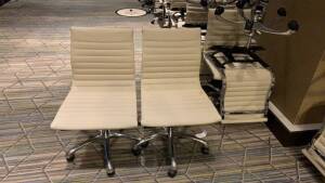 LOT OF (50) CHARTER FURNITURE WHITE PNEUMATIC CHAIRS (MUST TAKE LOTS AS STACKED, PLEASE INSPECT)(SOME HAVE RIPS AND LOOSE FABRIC) (LOCATION: MAIN LOBBY)