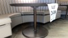 LOT OF (2) WOOD ROUND TABLES WITH METAL BASE 4FT WITH (2) BOOTHS 197 INCHES X 4FT X 42 INCHES HIGH (LOCATION: LOBBY LOUNGE) - 2