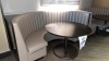 LOT OF (2) WOOD ROUND TABLES WITH METAL BASE 4FT WITH (2) BOOTHS 197 INCHES X 4FT X 42 INCHES HIGH (LOCATION: LOBBY LOUNGE) - 3