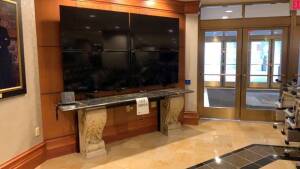 AVON TILE COMPANY TABLE WITH MARBLE TOP AND CEMENT BASE 8FT X 21 INCHES X 34 INCHES WITH (4) 50 INCH SAMSUNG TELEVISIONS (NO REMOTE OR POWER CABLES) (MARBLE TOP HAS CRACKS) (LOCATION: MAIN LOBBY)