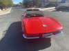 1961 Corvette, 2-Door convertible in "roman red" w/ white contrasting cove, black interior, Chevy 357 high performance 5 speed engine, 4 New Tires,  3,534 miles indicated, built at St. Louis assembly plant, VIN: 10867S106702. - 6