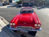 1961 Corvette, 2-Door convertible in "roman red" w/ white contrasting cove, black interior, Chevy 357 high performance 5 speed engine, 4 New Tires,  3,534 miles indicated, built at St. Louis assembly plant, VIN: 10867S106702. - 7