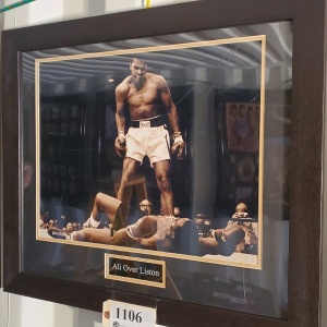 FRAMED MUHAMMED ALI MEMORABILIA “ALI OVER LISTON” (27X23.5)