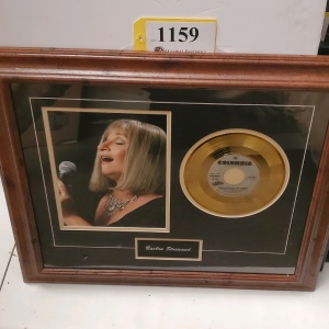 FRAMED BARBRA STREISAND MEMORABILIA (23.5X20)