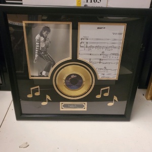 FRAMED MICHAEL JACKSON MEMORABILIA (25X22)