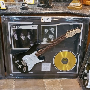 FRAMED BEATLES MEMORABILIA WITH ELECTRIC GUITAR AND “PARLOPHONE” RECORD (SIGNATURE IS UNAUTHENTICATED)(43X35)