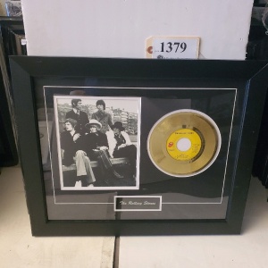 FRAMED MEMORABILIA OF THE ROLLING STONES (23X19)