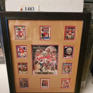 FRAMED MEMORABILIA OF JOE MONTANA FOOTBALL CARDS (23.5X28)