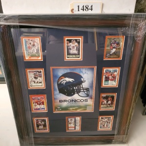 FRAMED MEMORABILIA OF BRONCOS FOOTBALL CARDS (23.5X28)