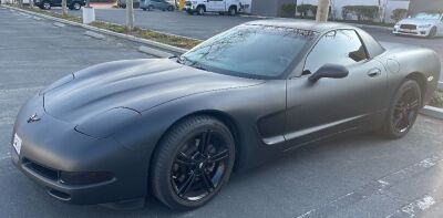 2000 CHEVROLET CORVETTE HARDTOP “FIXED-ROOF COUPE” “FRC”, 5.7L V8, 6-SPEED MANUAL TRANSMISSION, BLACK (WITH MATTE BLACK WRAP), BLACK LEATHER INTERIOR, Z51 PACKAGE STANDARD, B&B TRI-FLOW EXHAUST, K&N INTAKE, KEYLESS DOOR ENTRY,102,000 MILES, VIN: 1G1YY12G8