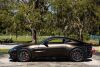 2019 Aston Martin Vantage finished in Kopi Bronze over Pure Black/ Californian Poppy Leather. 503 hp 4.0L Twin Turbo V8 Engine, 8 Speed automatic transmission, 3 Drive Modes - Sport Sport+ and Track - 5