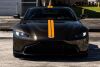 2019 Aston Martin Vantage finished in Kopi Bronze over Pure Black/ Californian Poppy Leather. 503 hp 4.0L Twin Turbo V8 Engine, 8 Speed automatic transmission, 3 Drive Modes - Sport Sport+ and Track - 12