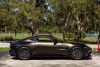 2019 Aston Martin Vantage finished in Kopi Bronze over Pure Black/ Californian Poppy Leather. 503 hp 4.0L Twin Turbo V8 Engine, 8 Speed automatic transmission, 3 Drive Modes - Sport Sport+ and Track - 13