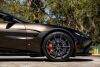 2019 Aston Martin Vantage finished in Kopi Bronze over Pure Black/ Californian Poppy Leather. 503 hp 4.0L Twin Turbo V8 Engine, 8 Speed automatic transmission, 3 Drive Modes - Sport Sport+ and Track - 15