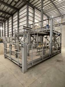 (2) Distilling Units (Units stack on one another) Bottom Unit has Heat Exchanger, Condensing Units, 124'x250' Footprint